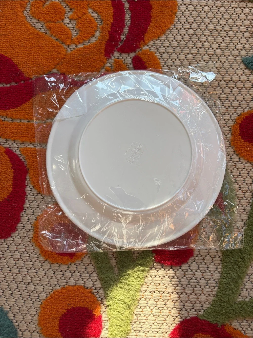 Two Harley-Davidson White Plates with Black Shield Logo